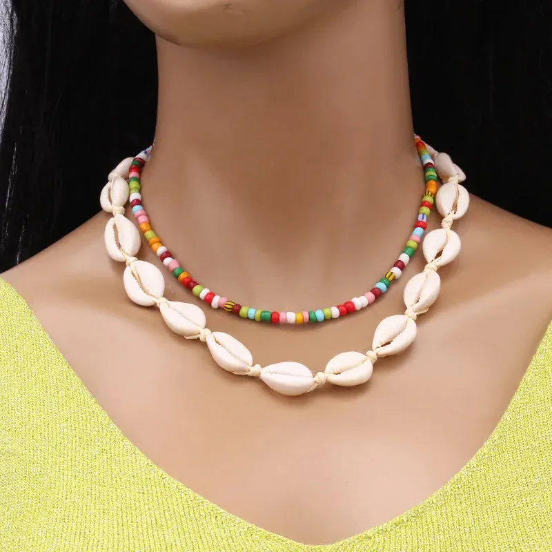 Bohemian multi-layered shell and rice bead necklace