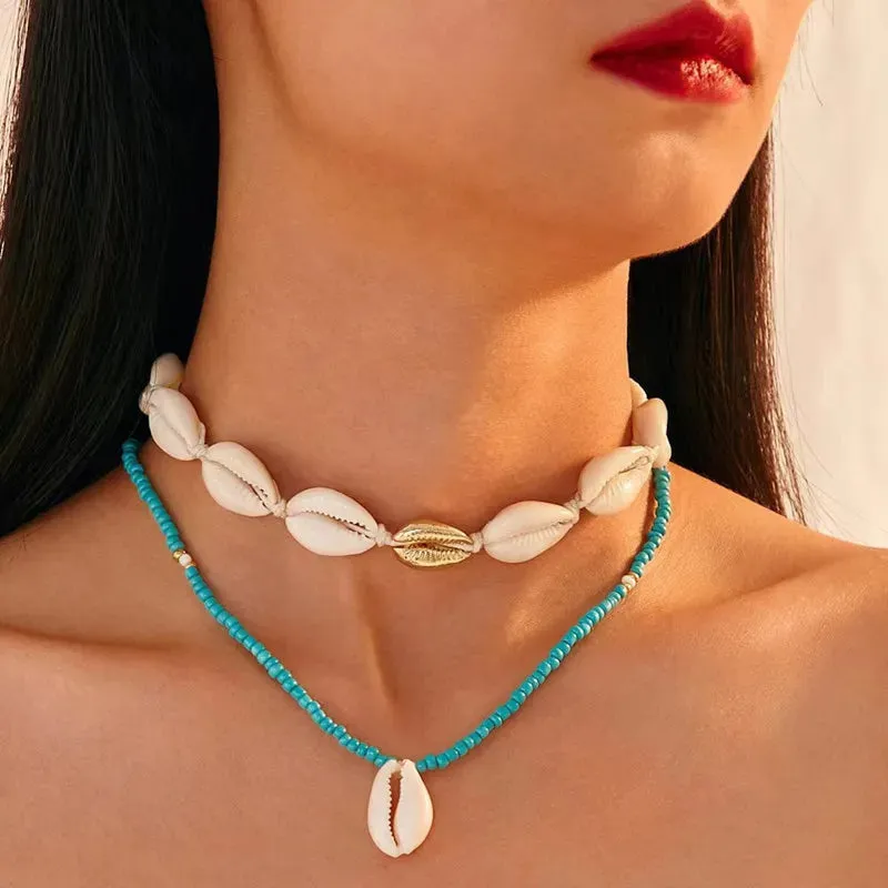 Bohemian multi-layered shell and rice bead necklace