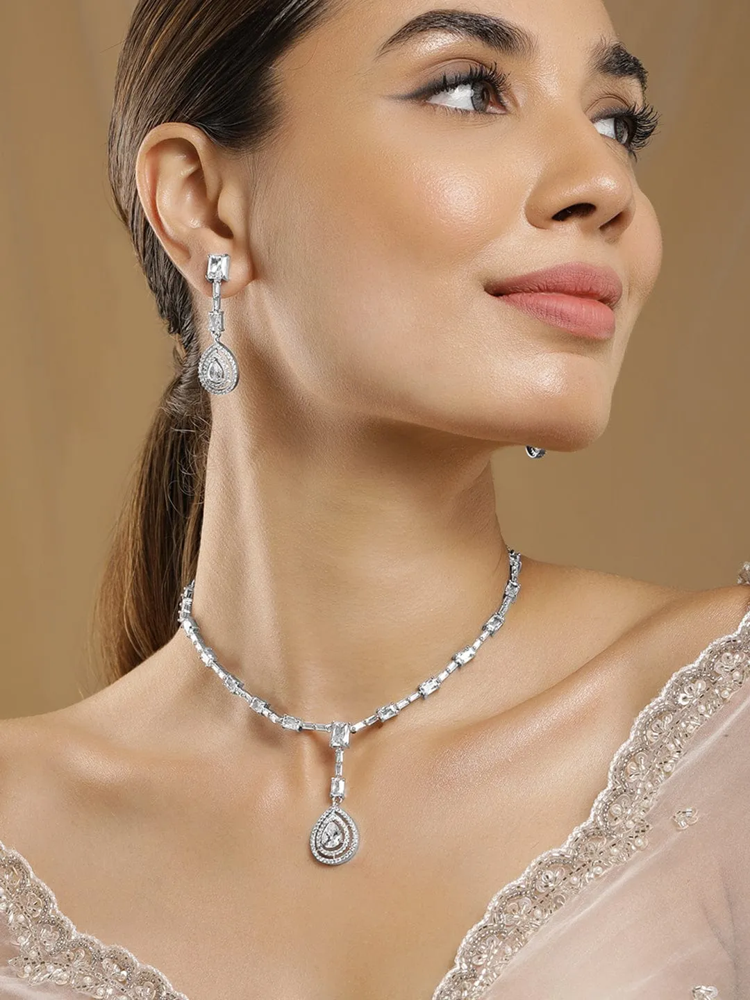 Rhodium Plated AD & Cubic Zirconia Studded Necklace Set with Teardrop Pendants