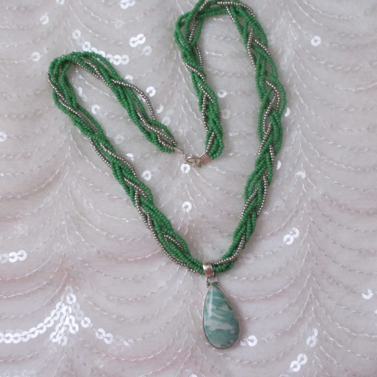 Vasonite Gemstone Pendant on  Green Multi-strand Necklace